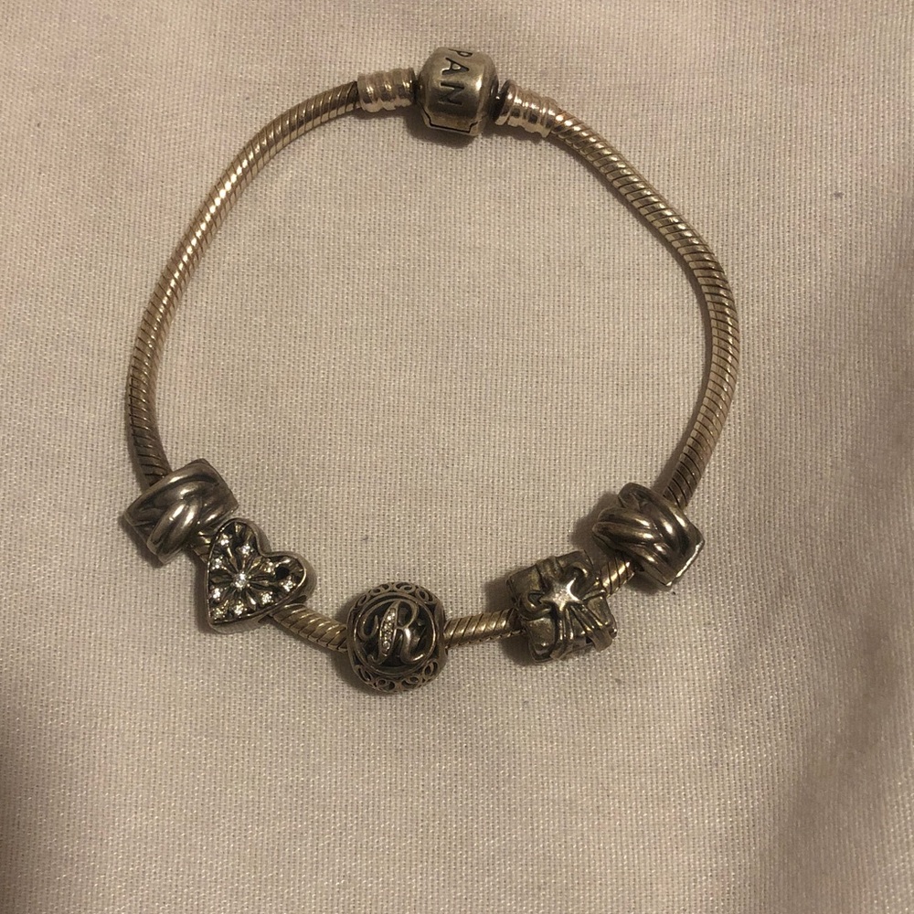 Pandora Moments Barrel Clasp Snake Chain Bracelet
Sterling silver w/ 3 charms